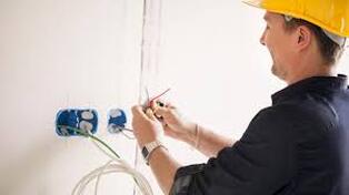 Electrician repairing wiring